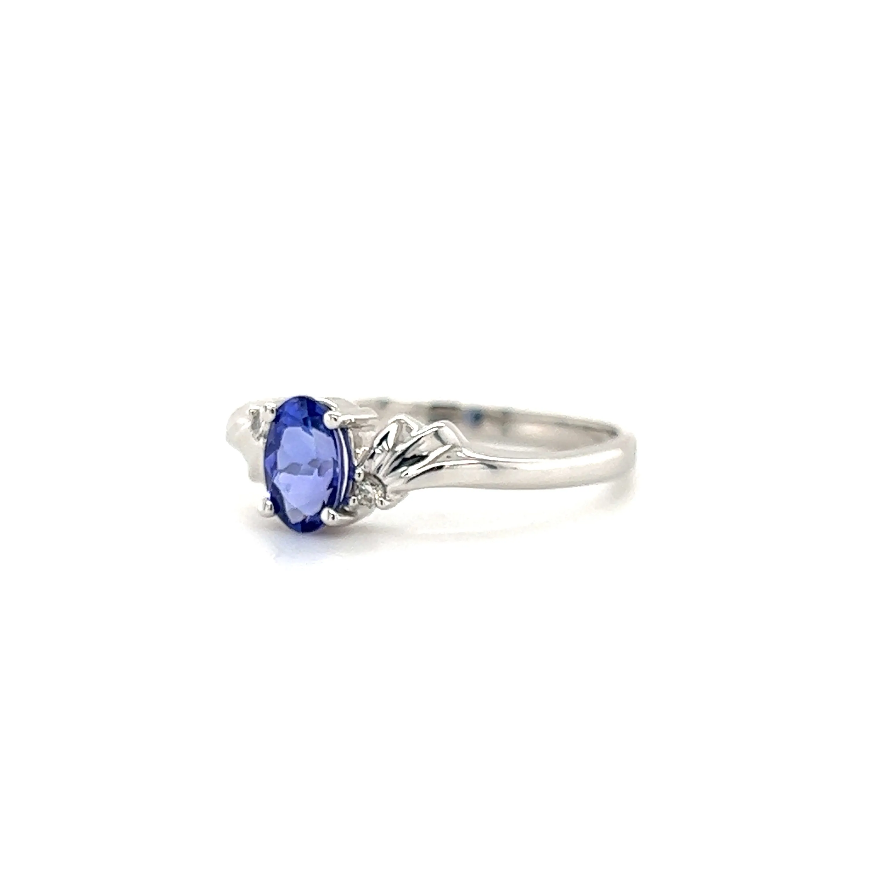 Oval Tanzanite Ring with Two Side Diamonds in 14K White Gold